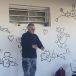 El artista argentino Emilio Ferrero visitó San Salvador y dejó su impronta en escuelas de la ciudad